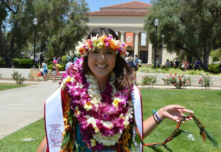 Women wearing Hawaiian leis at graduation
